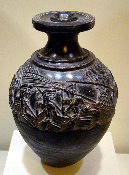Stone rhyton with a scene of harvesters returning from the fields. From Agia Triada